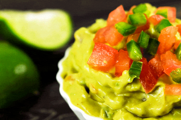 Tangy Homemade Guacamole Dip - This Tangy Homemade Guacamole dip will be the only guacamole recipe you'll ever refer to!! It's creamy, tangy and just perfect! Who needs store bought guacamole when the homemade one can be so easy and delicious?!| ScrambledChefs.com