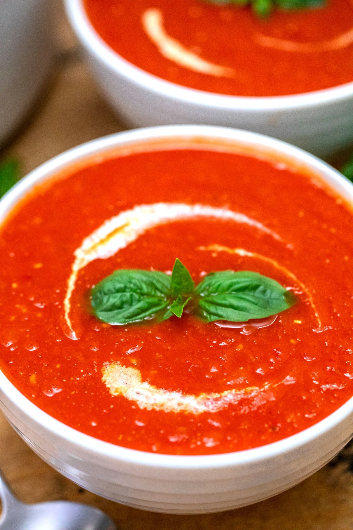 White bowl with tomato soup