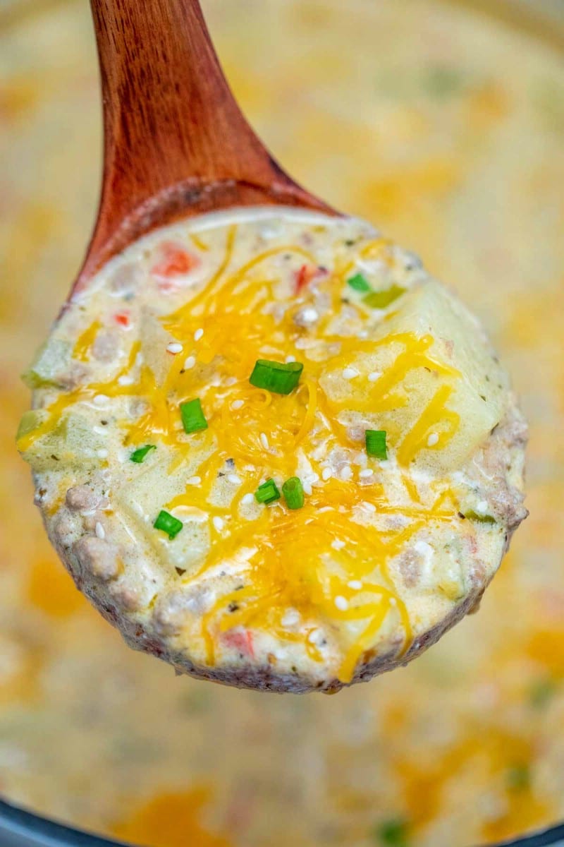 Wooden spoon of cheeseburger soup