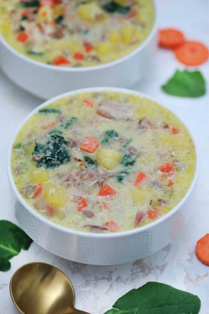 White bowl of zuppa toscana soup
