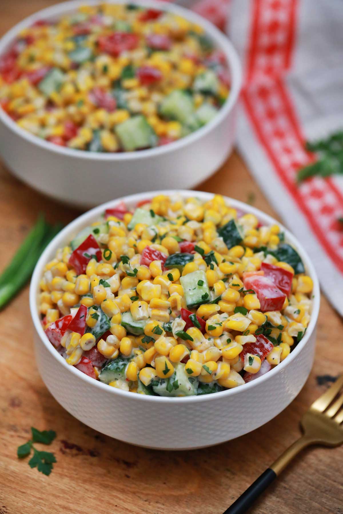 White bowl of corn salad