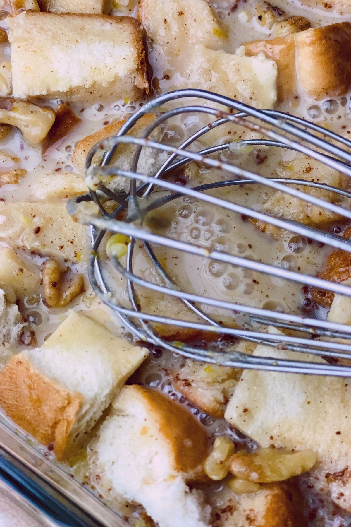 Bread covered in pudding sauce mixture