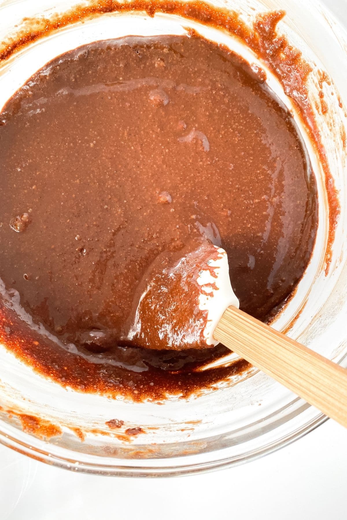 Mixing ingredients in glass bowl