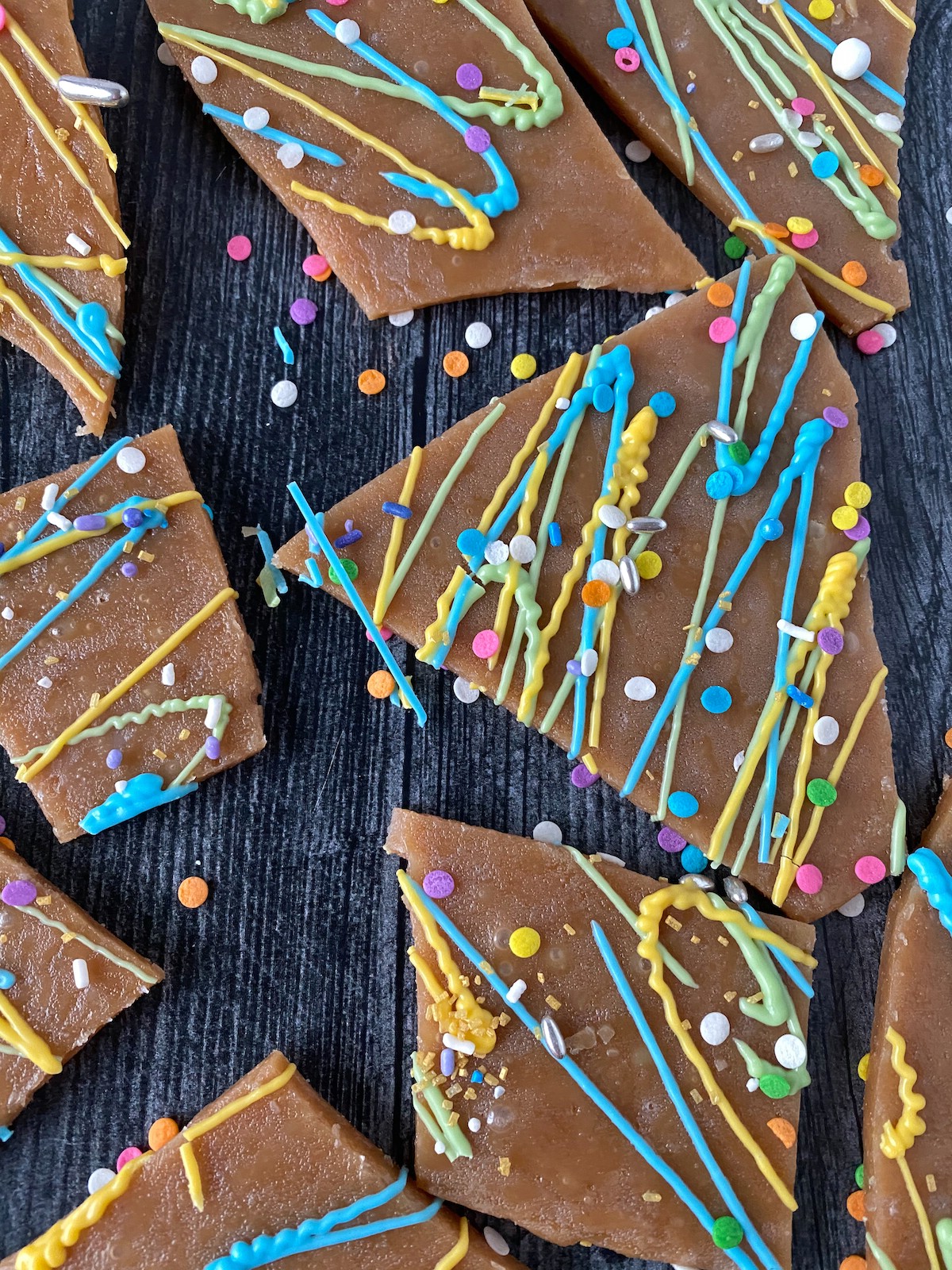 Decorated toffee laying on black table