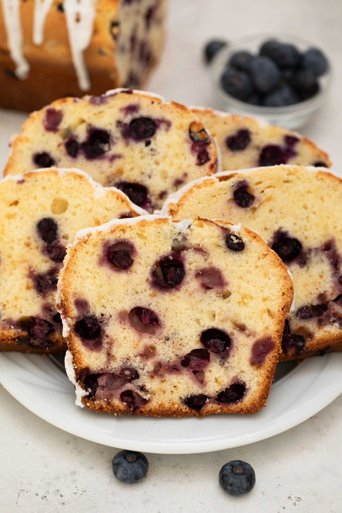 Stack of sliced sweet bread on white plate