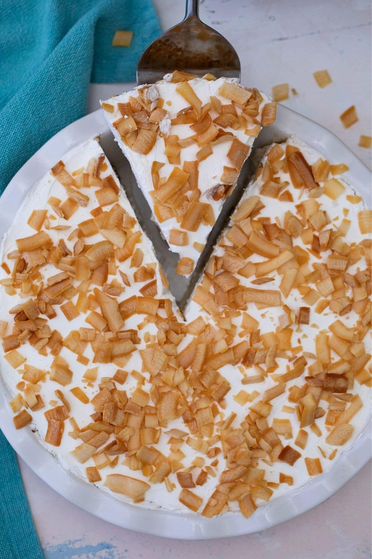 Removing a slice of pie from a pie plate
