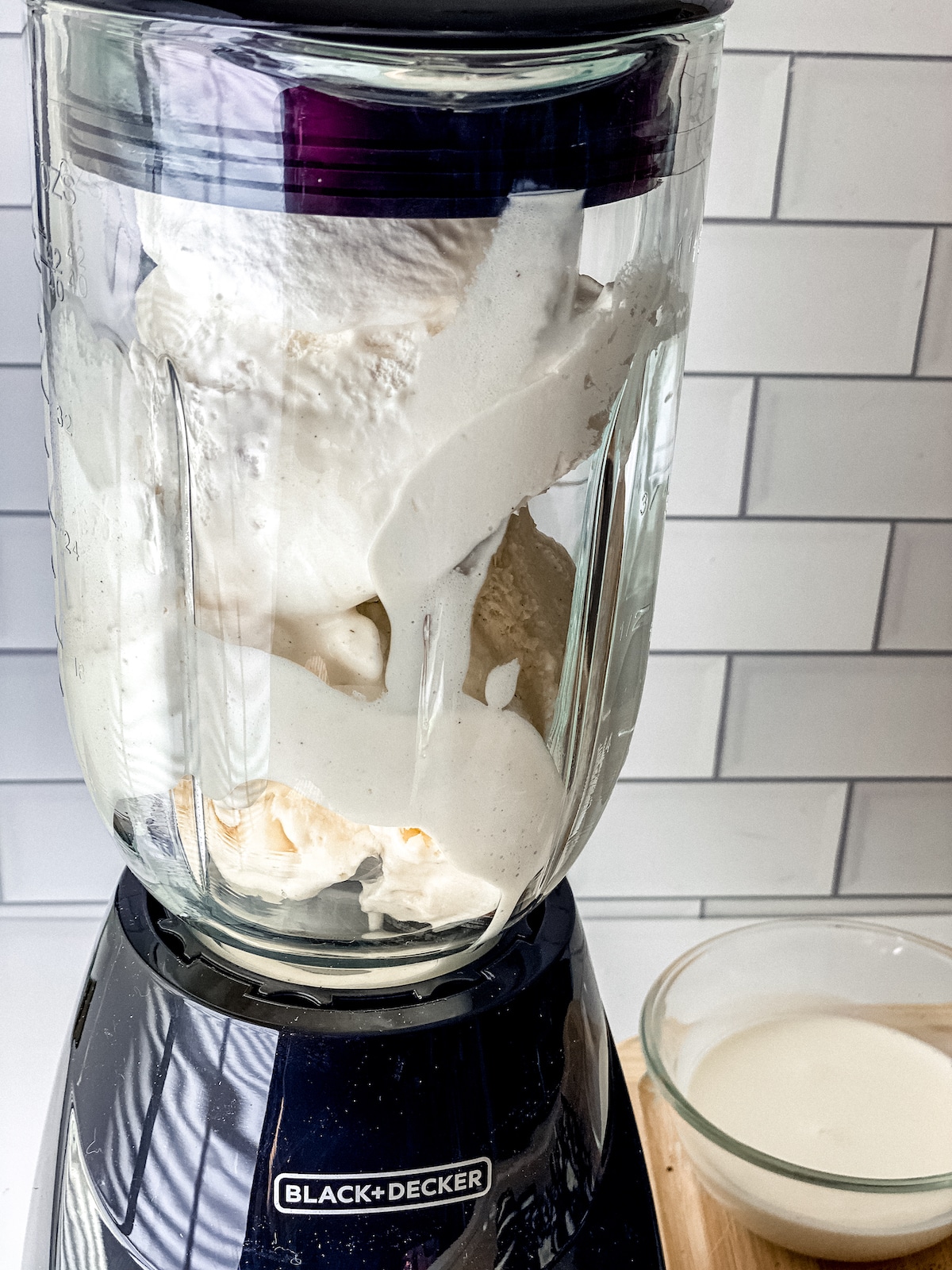 Blender filled with ice cream and cool whip