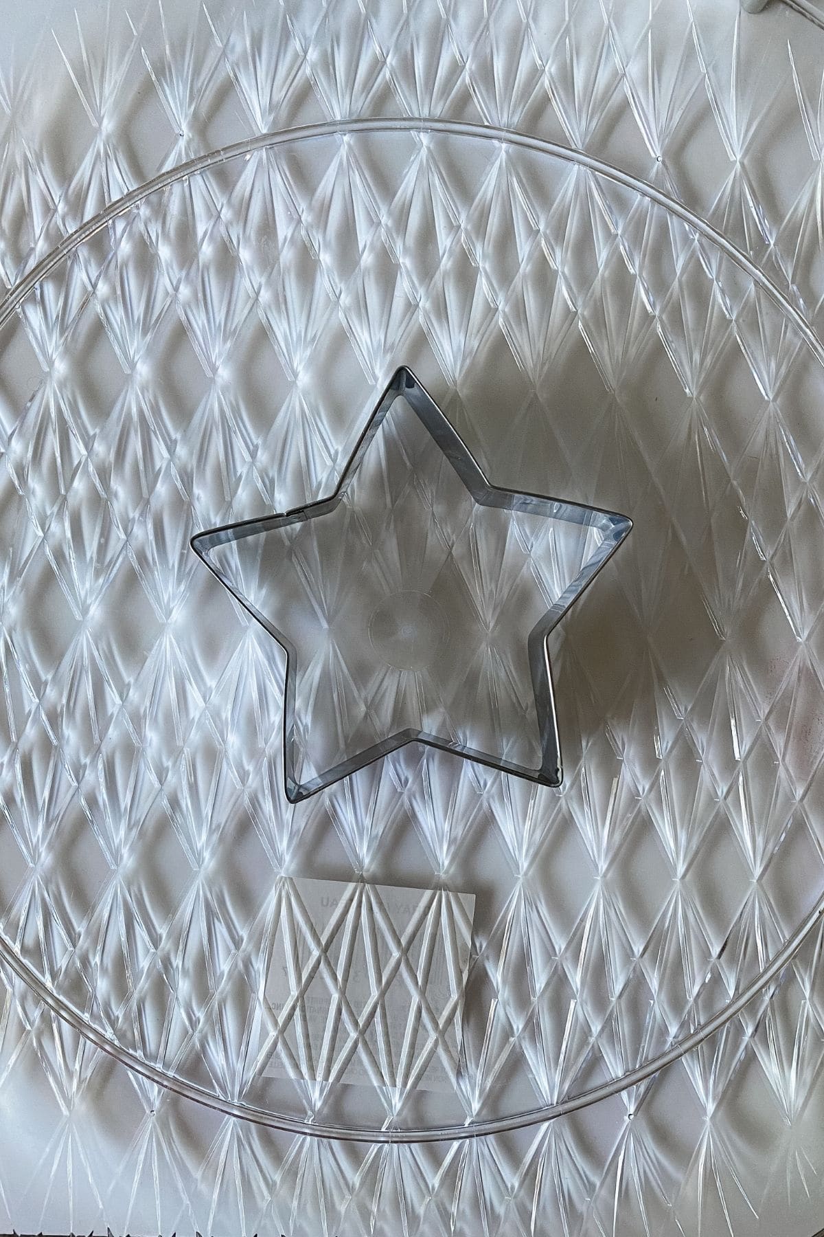 Large star cookie cutter in center of round platter