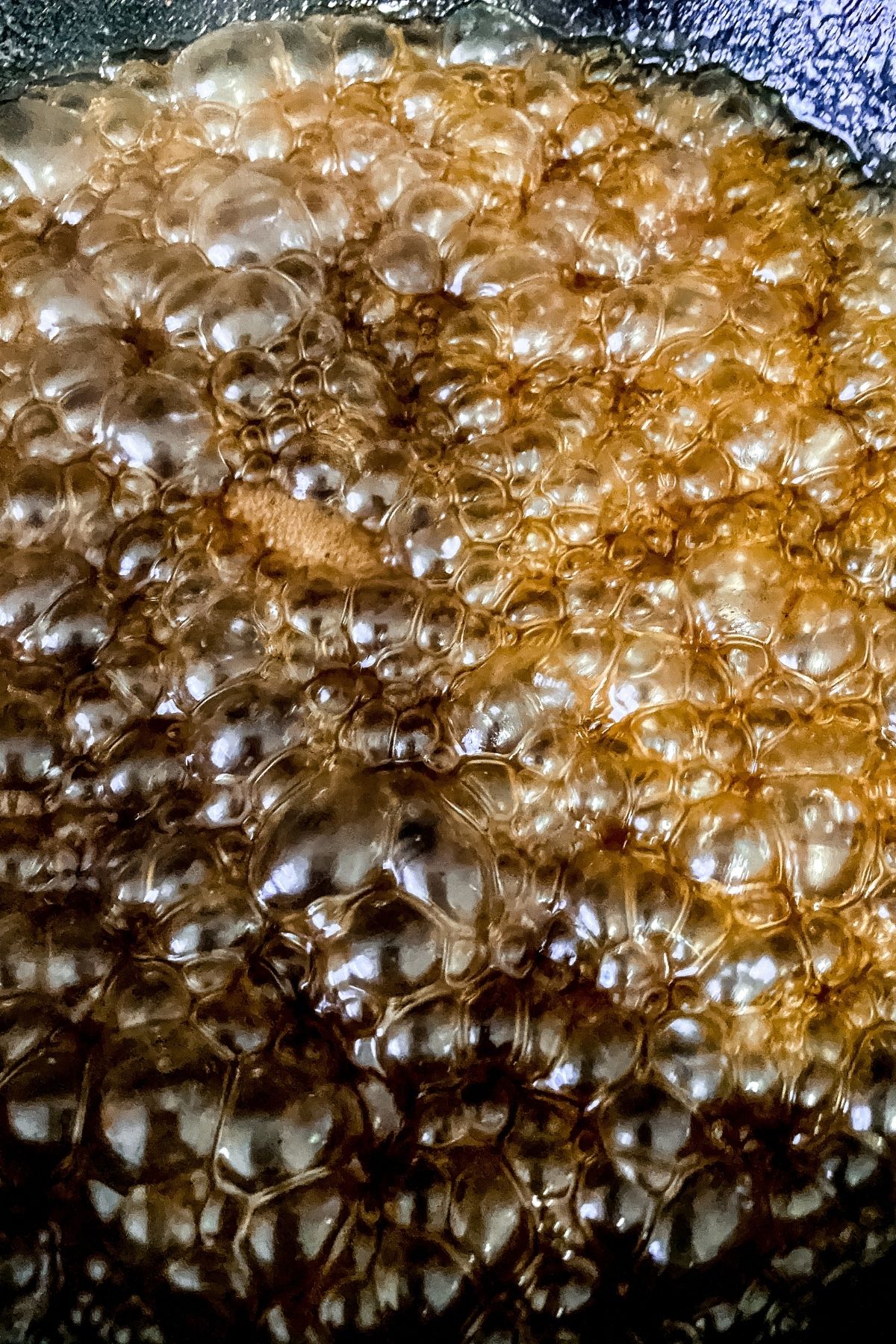 Syrup cooking down in cast iron skillet