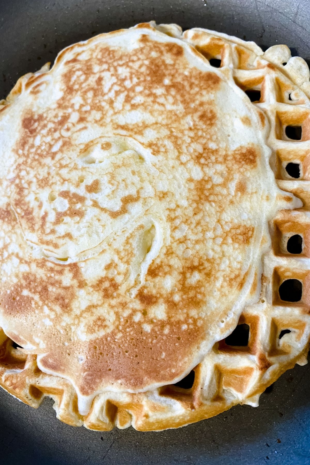 pancake on waffle in skillet