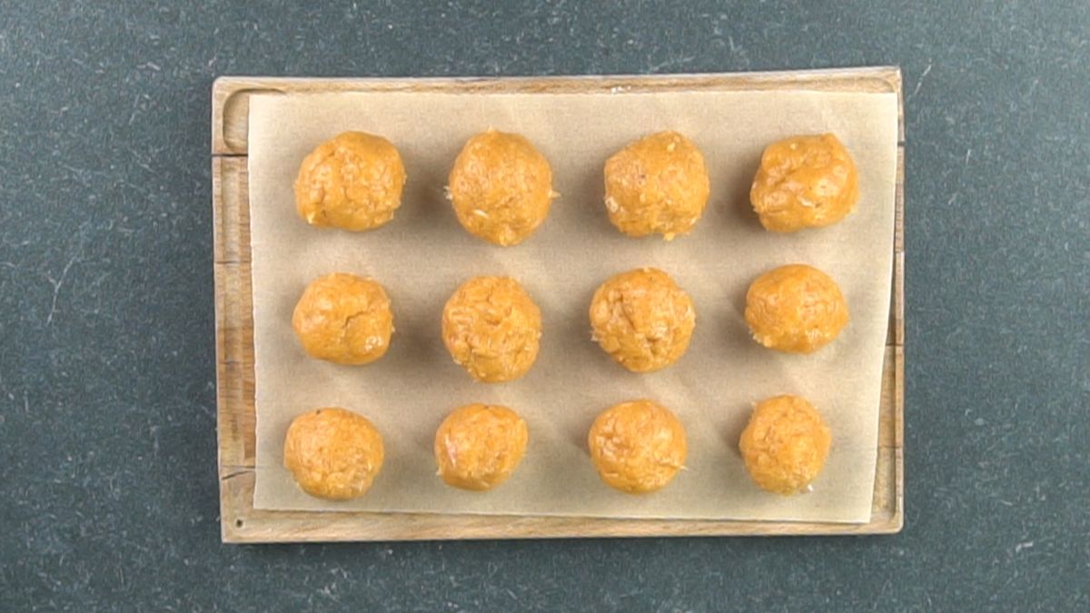 chicken balls on parchment lined platter