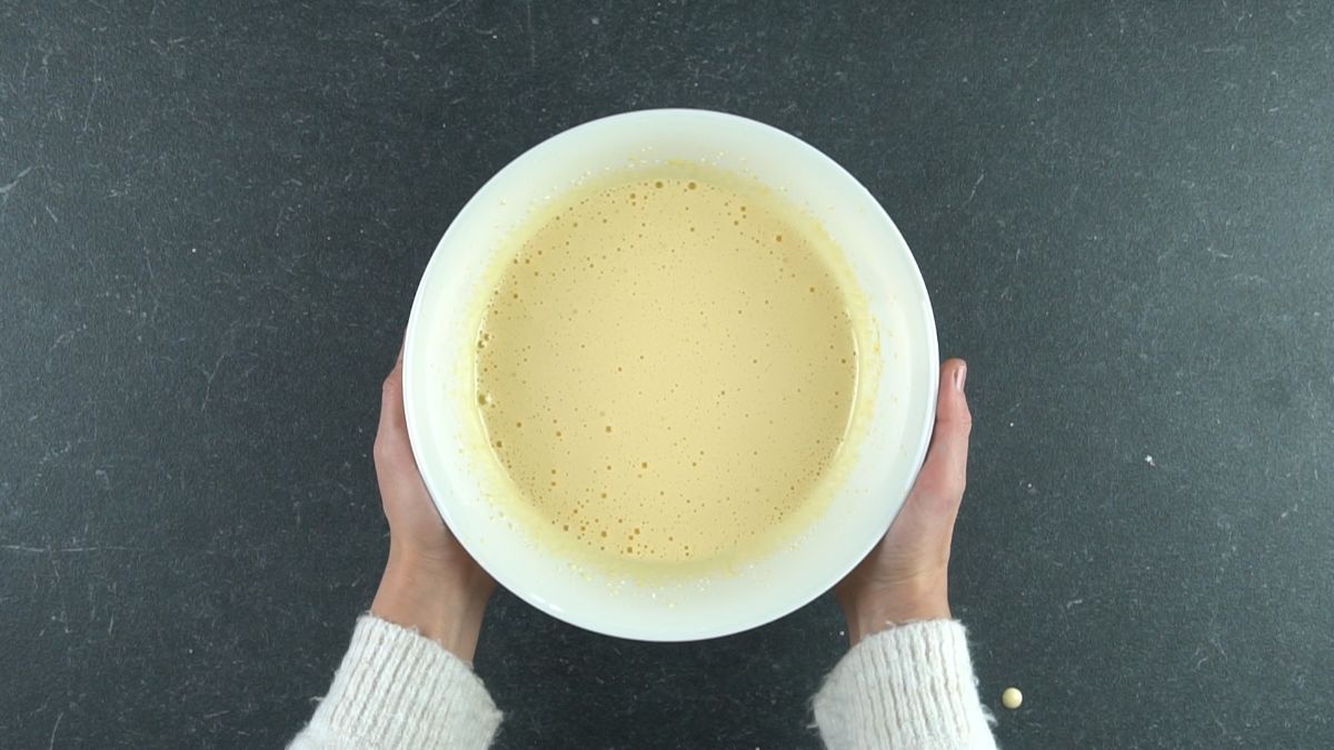 wet ingredients for cake in white bowl
